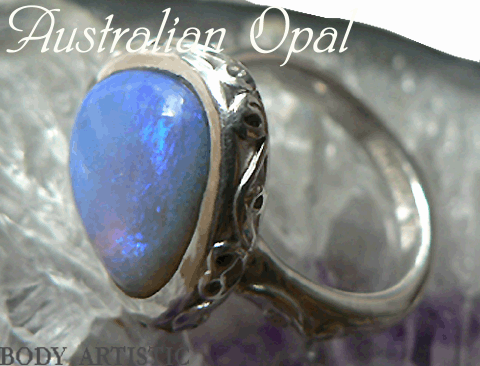 seraphim,bolder opal, yellow,red roumaline ring